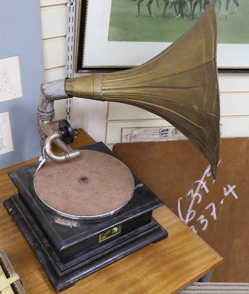 A “His Masters Voice” gramophone with horn